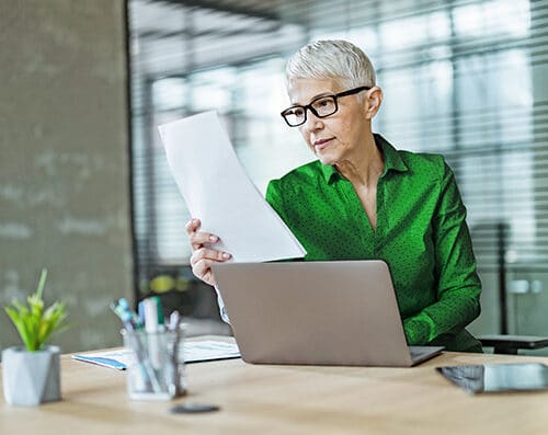 Woman reading healthcare regss